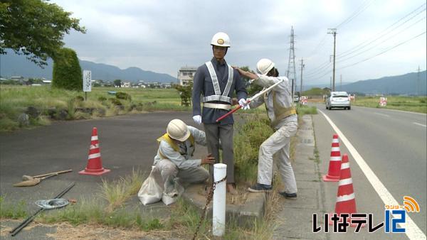 春日街道に交通安全人形設置